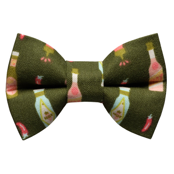 Bow tie for cats and dogs with hot sauce and chili pepper print with green background 